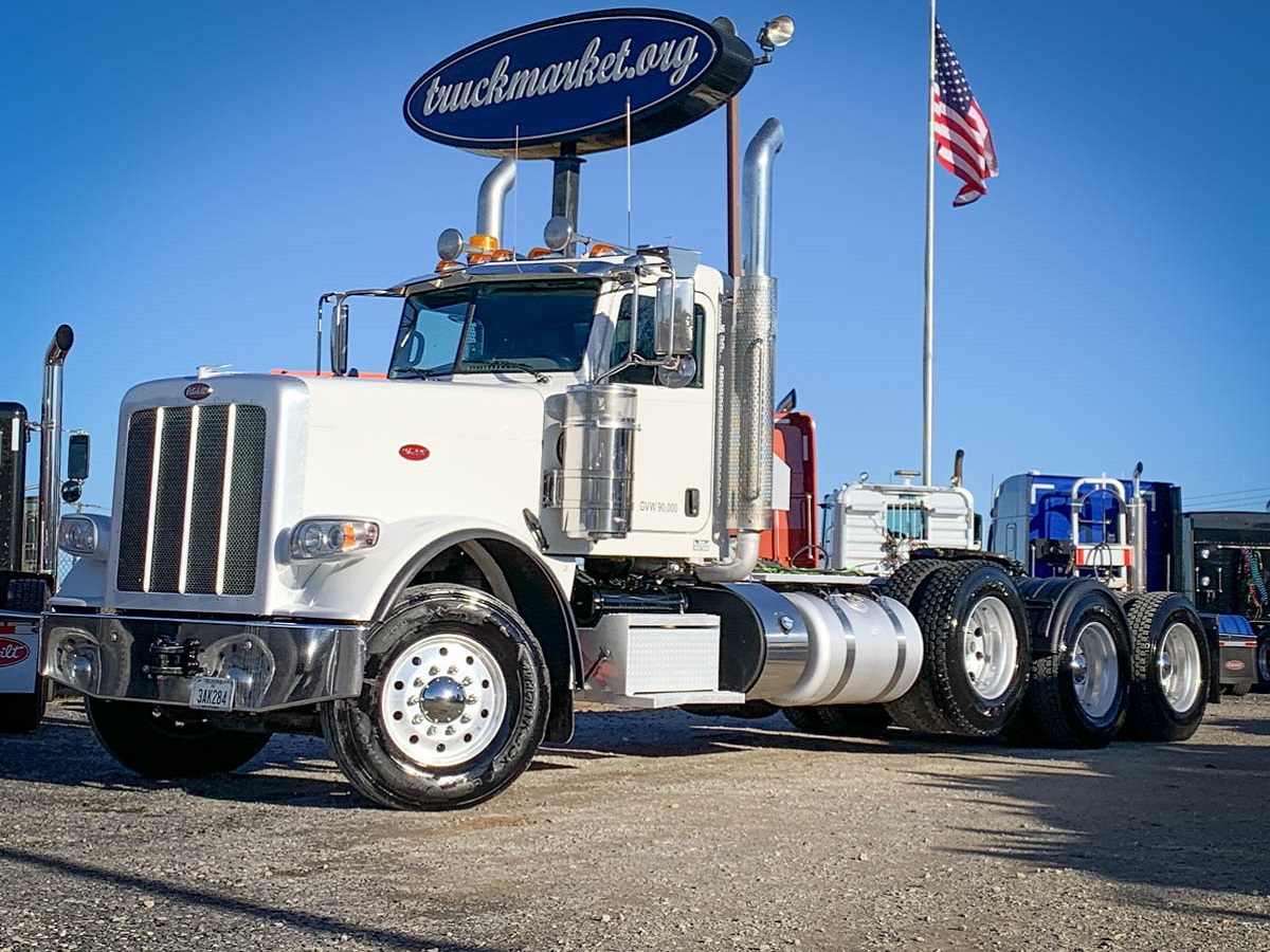 2018 PETERBILT 389 TRI AXLE DAYCAB